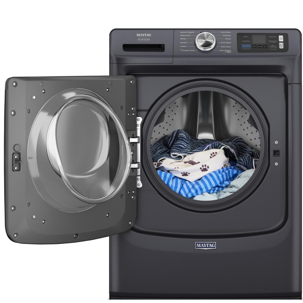 Front load washer with open door showing laundry inside, part of washers and appliances for home improvement.