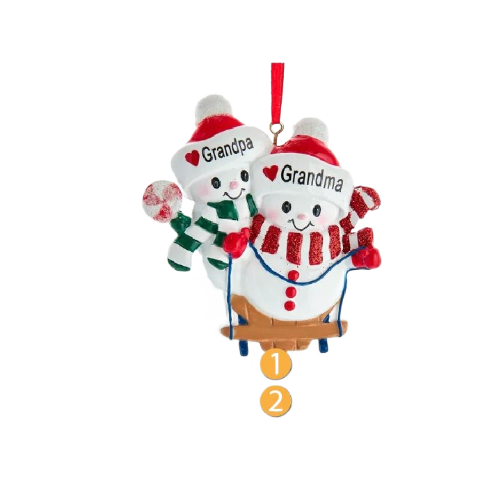 Personalized Grandma and Grandpa snow couple sledding Christmas ornament with red and green winter scarves
