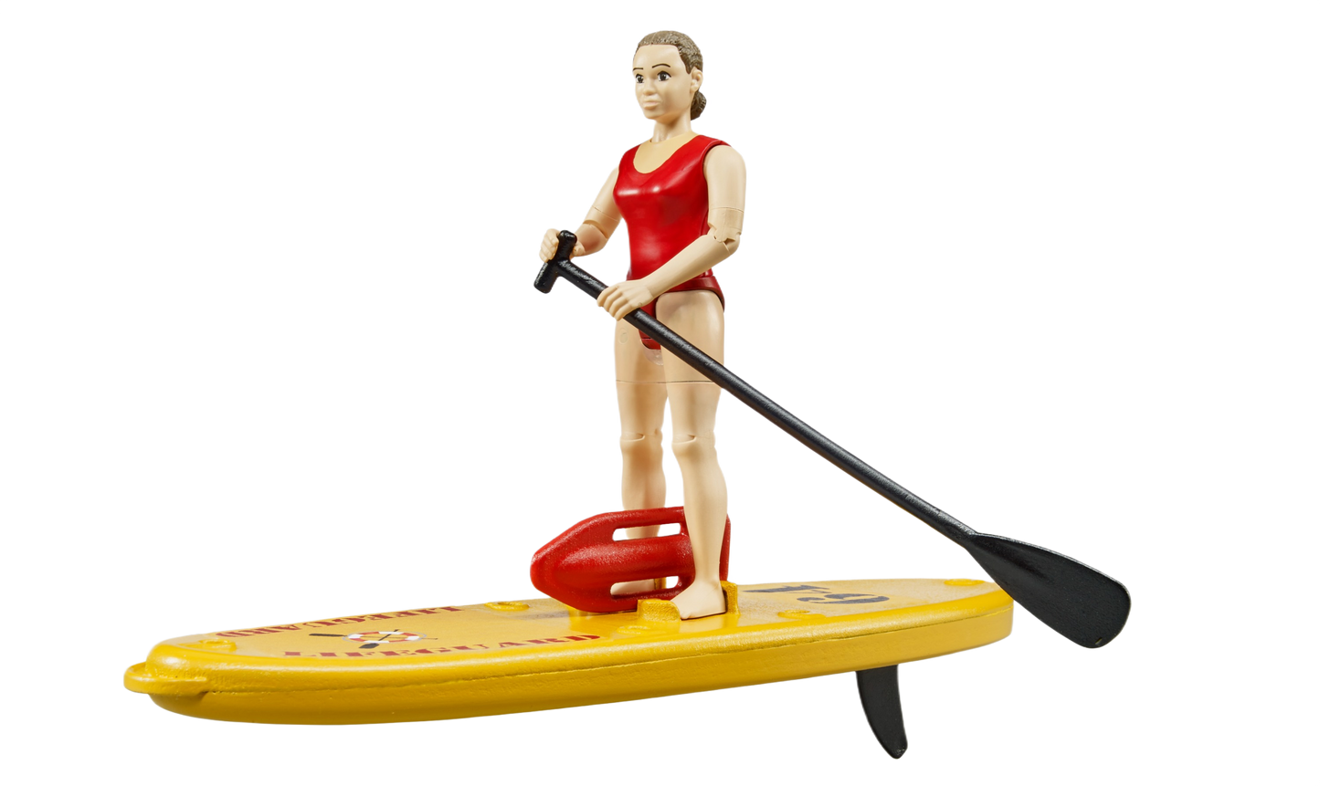 Lifeguard toy figure in red swimsuit standing on yellow paddleboard holding black paddle for active play.