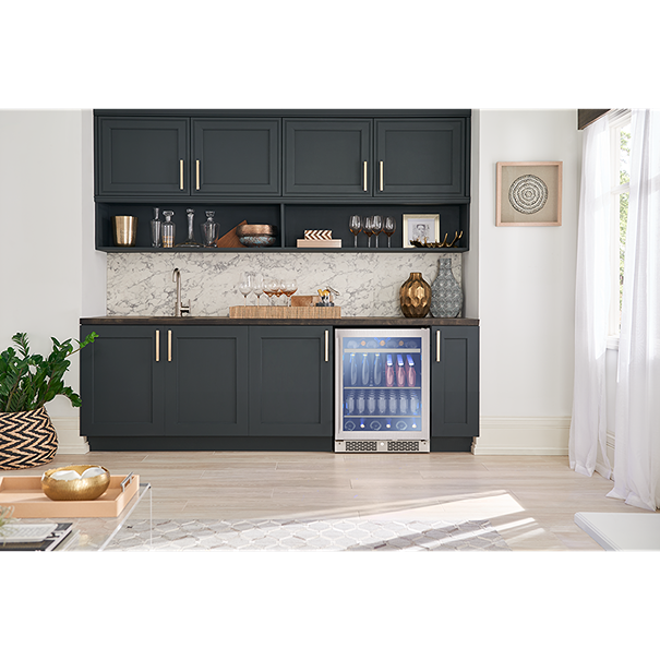 Under-counter single-zone beverage cooler with glass door and wood racks in kitchen and appliance collections