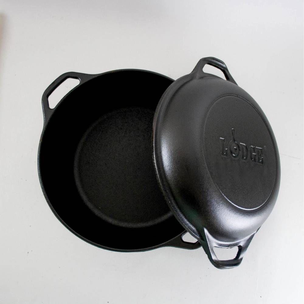 Black cast iron double Dutch oven with lid and handles for durable cooking in kitchenware and Lodge cast iron collections