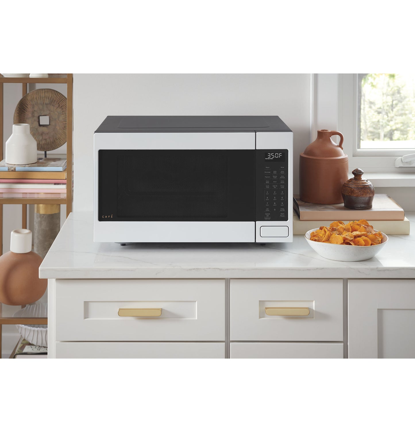 White smart countertop convection microwave with digital control panel on kitchen counter in Appliances collection