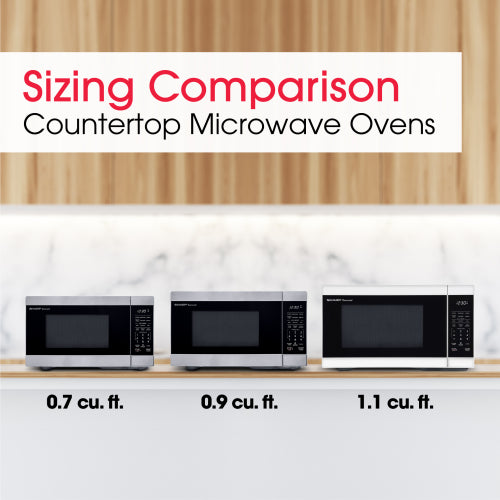 Three stainless steel countertop microwave ovens in a size comparison from 0.7 to 1.1 cubic feet in kitchen appliances collection