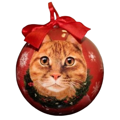 Red Christmas ball ornament featuring an orange tabby cat face with wreath and decorative snowflakes