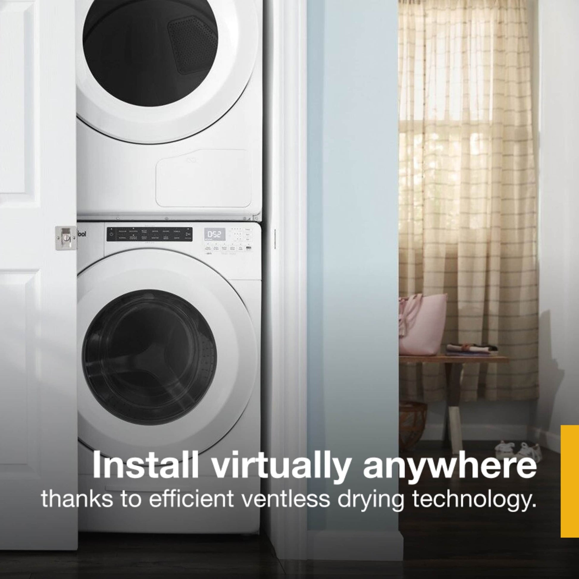 Stacked white front load washer and dryer units installed in a compact laundry closet space