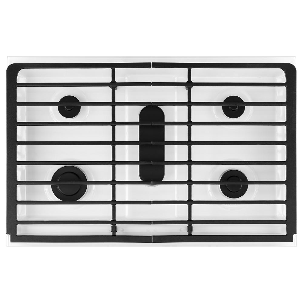 top view of white gas cooktop with four burners and black EZ-2-Lift hinged grates in kitchen appliances collection