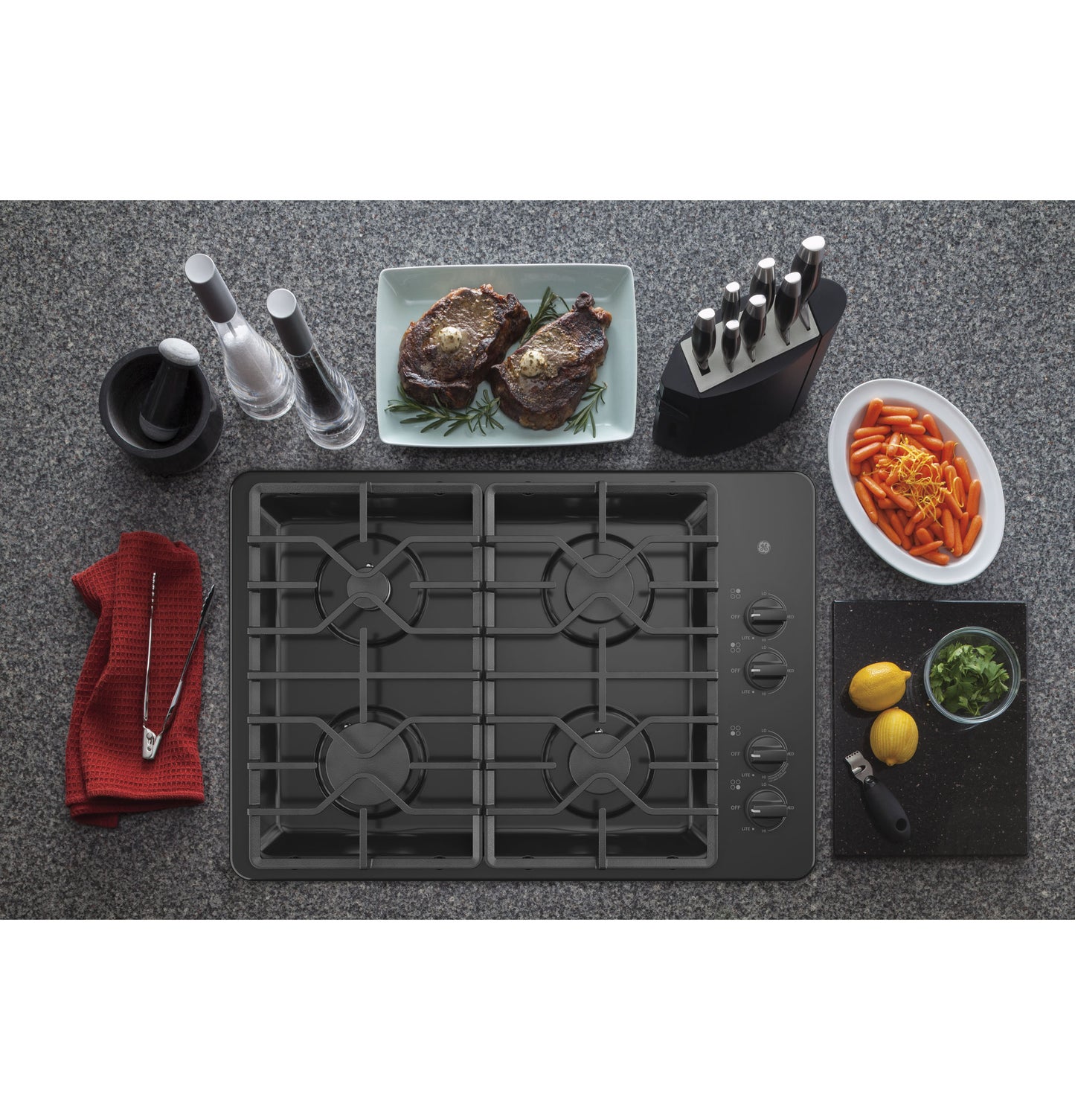 Black built-in 30-inch gas cooktop with four burners and dishwasher-safe grates in Kitchen & Kitchenware collection