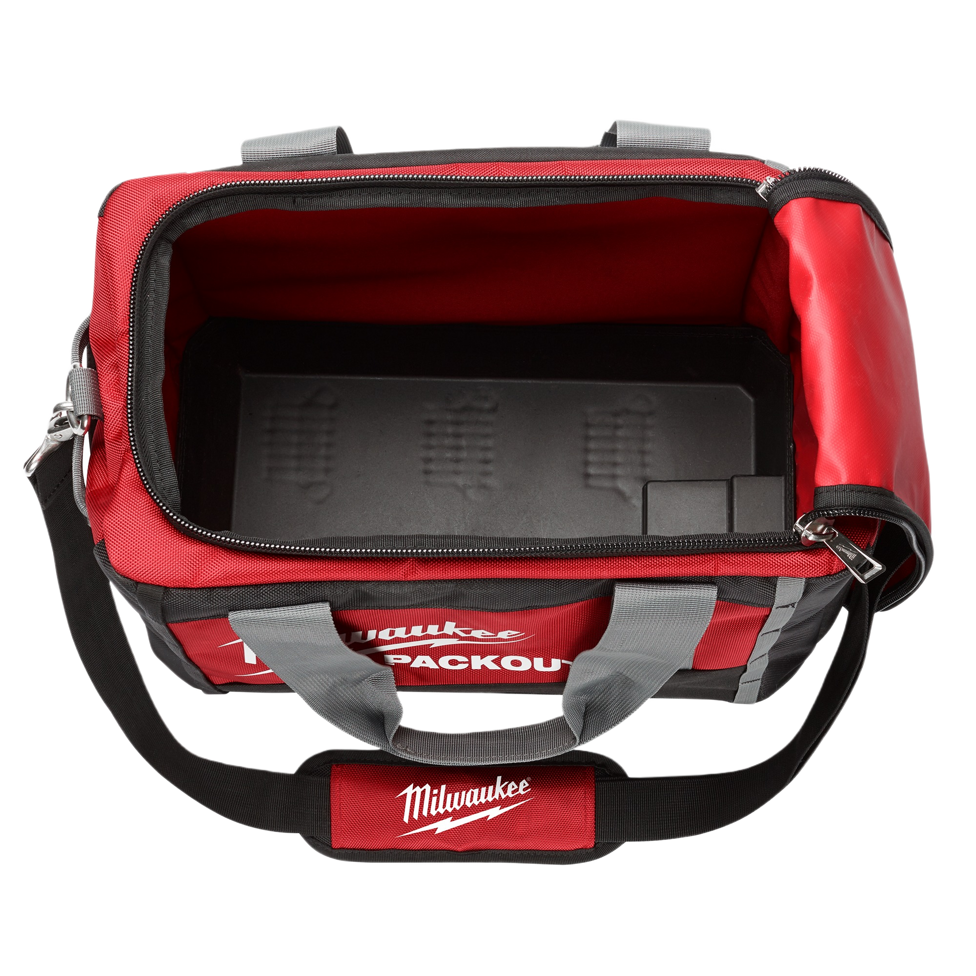 Red and black Milwaukee PACKOUT 15" tool bag with reinforced handles and removable base for tools and home improvement use