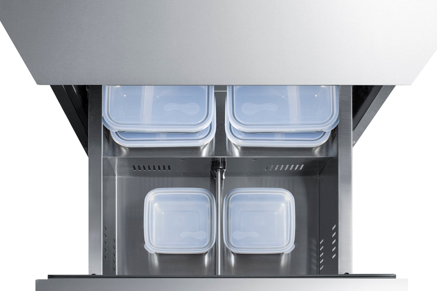 Overhead view of open stainless steel freezer drawer with four clear plastic storage containers inside for kitchen use