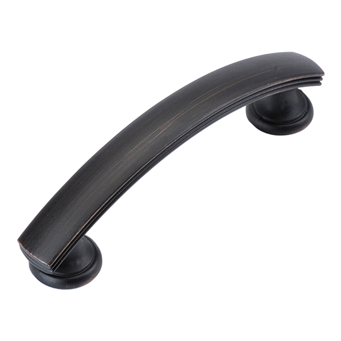 Vintage-style bronze cabinet pull with curved design for furniture hardware and home improvement projects