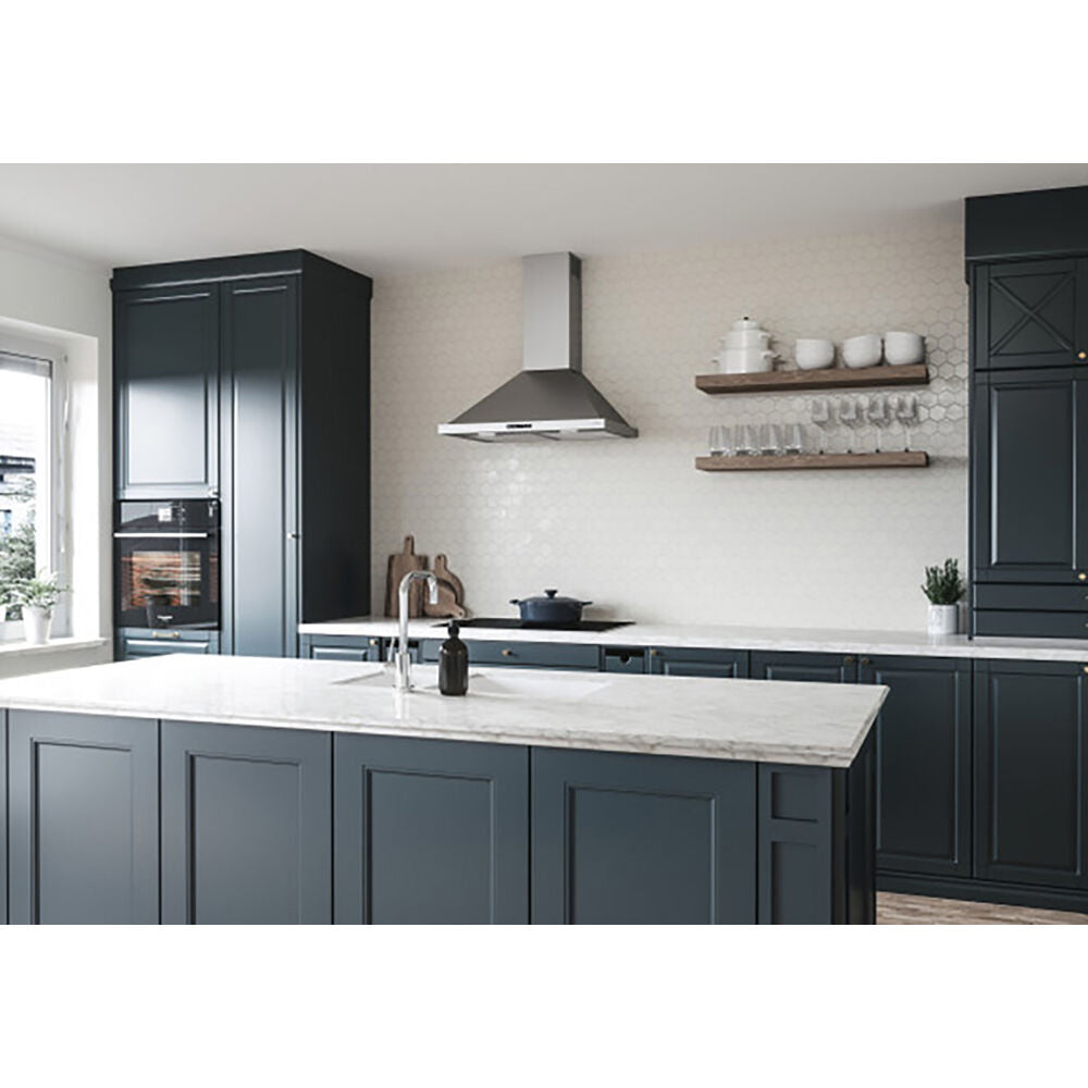 Modern kitchen with stainless steel chimney hood mounted above cooktop, gray cabinetry, and marble countertop island