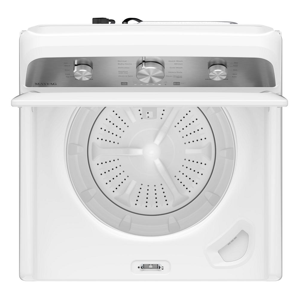Top view of white top load washer showing stainless steel control panel with three knobs and inner wash tub in washer collection