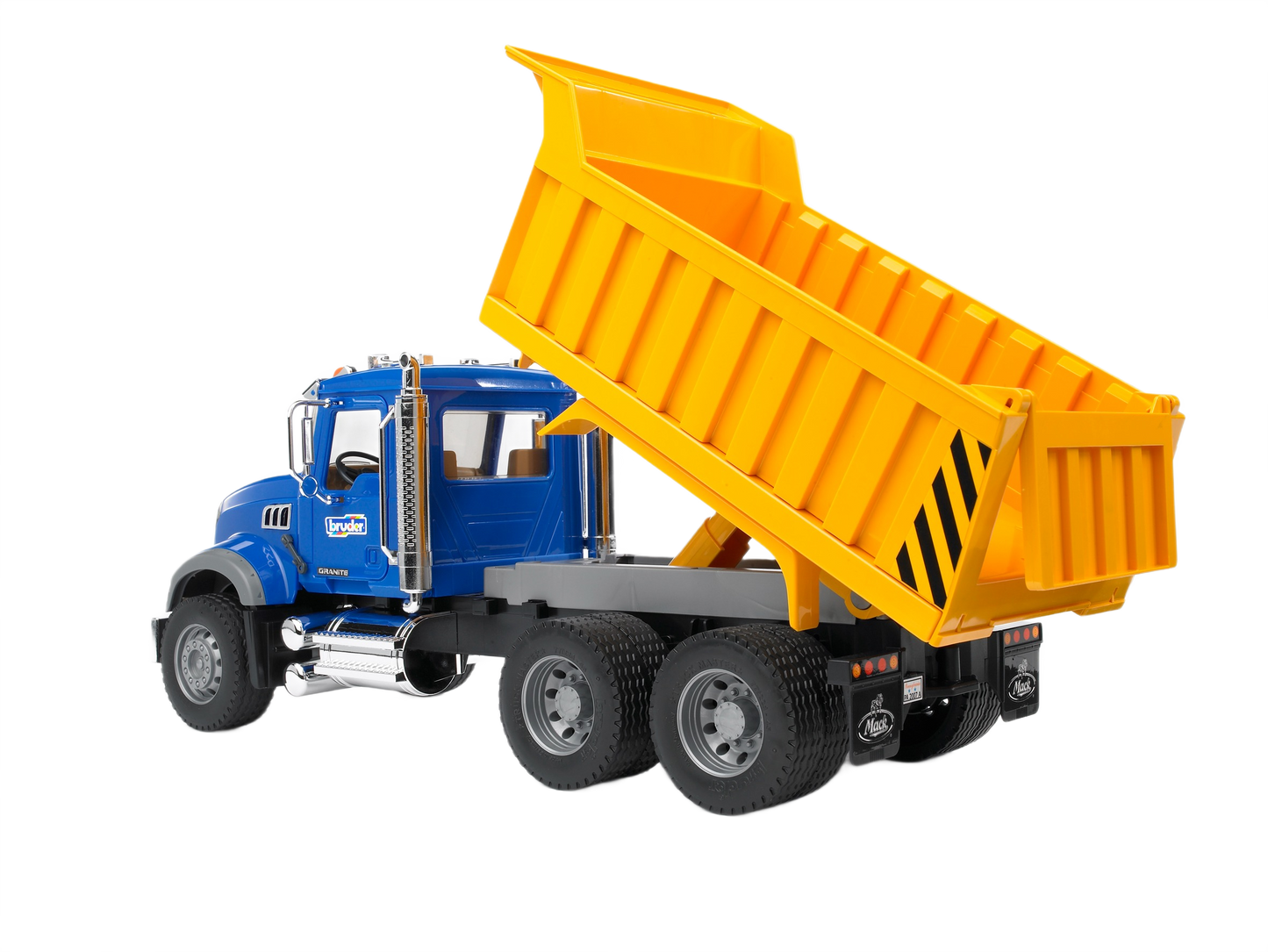 Blue and yellow Bruder MACK Granite dump truck toy with tilting bed for realistic construction play