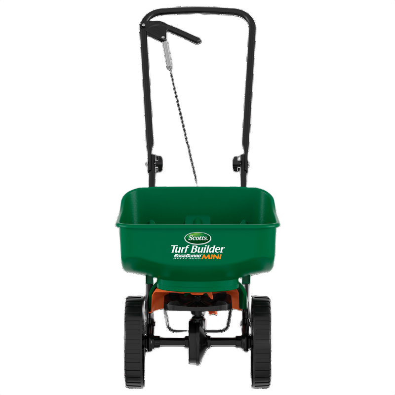 Green Scotts Turf Builder EdgeGuard mini broadcast spreader with black handle and wheels for lawn care tools