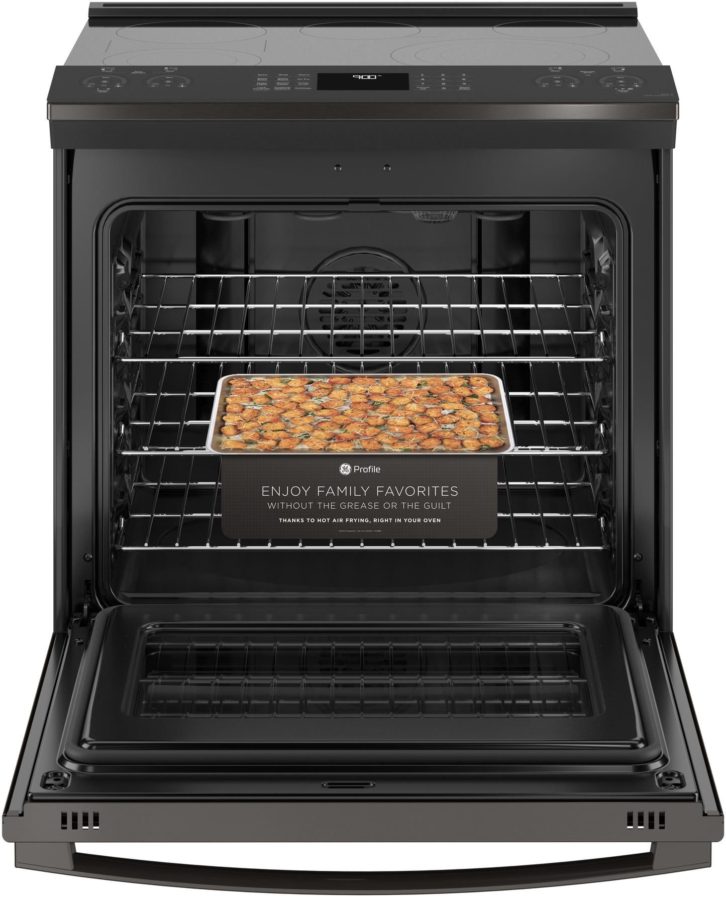 Open black electric convection range with tray of roasted food inside, featured in kitchen appliances and home improvement.