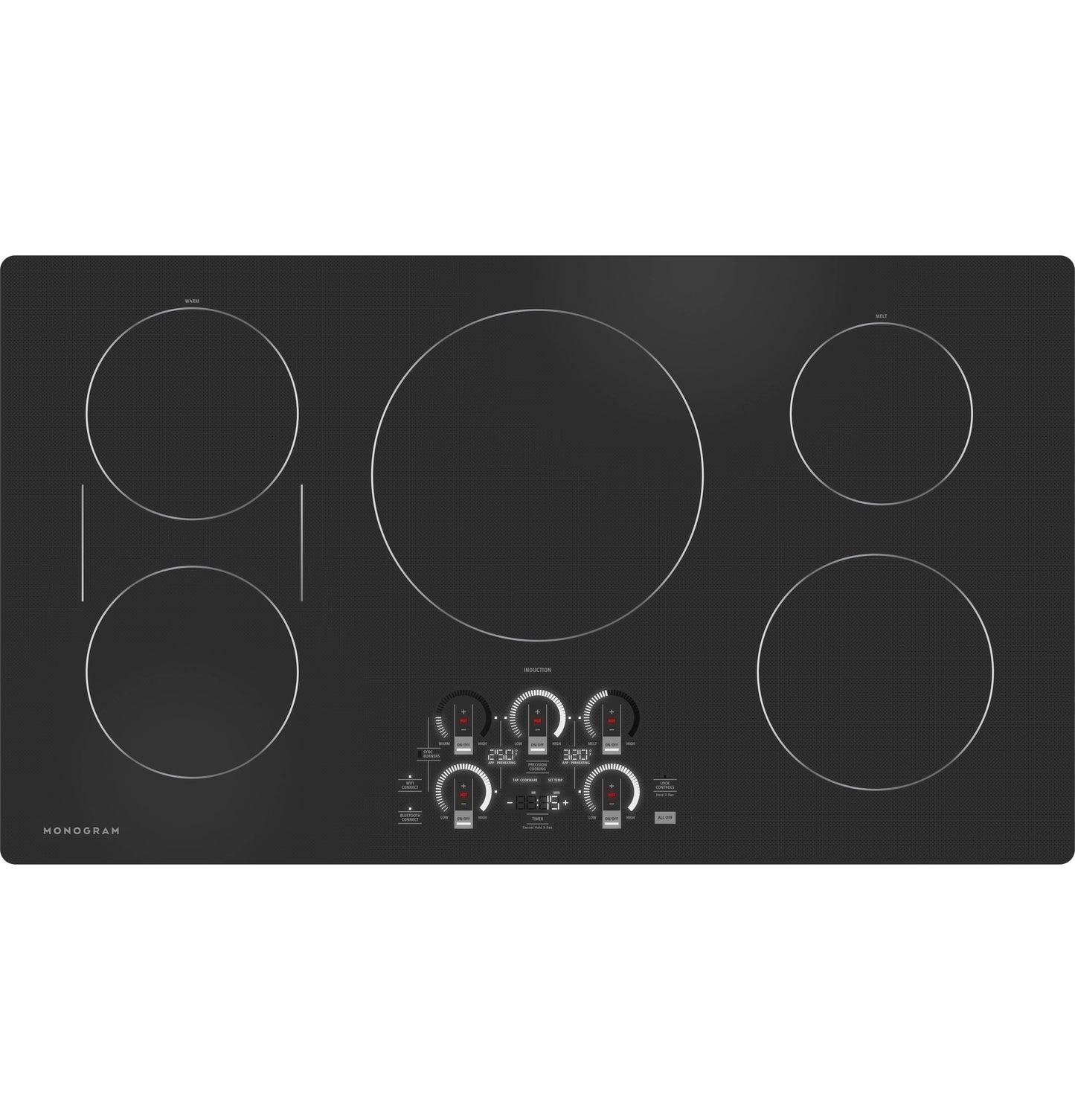 Black Monogram black glass induction cooktop with five cooking zones and control knobs from kitchen appliances collection