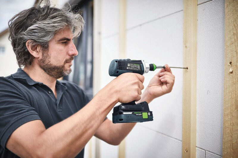 Man using cordless power drill with precision torx bit for home improvement and tool accessories under $50 collection
