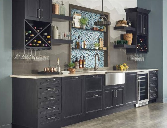 Dark kitchen cabinetry with polished nickel bar pulls in a modern home improvement and furniture hardware setting