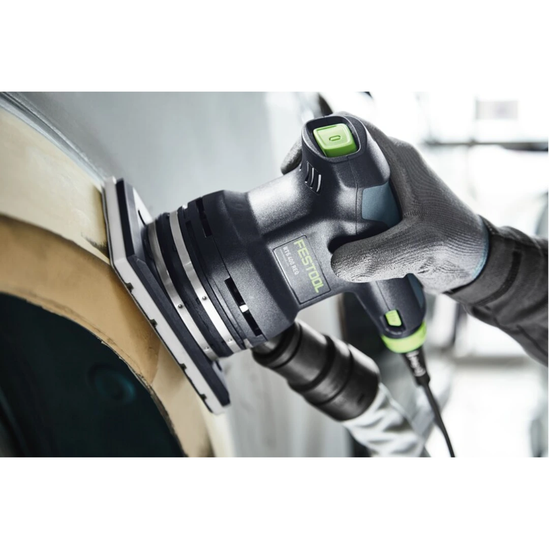 Gloved hand operating Festool power sander with rectangular sanding pad on curved surface in tool accessories collection