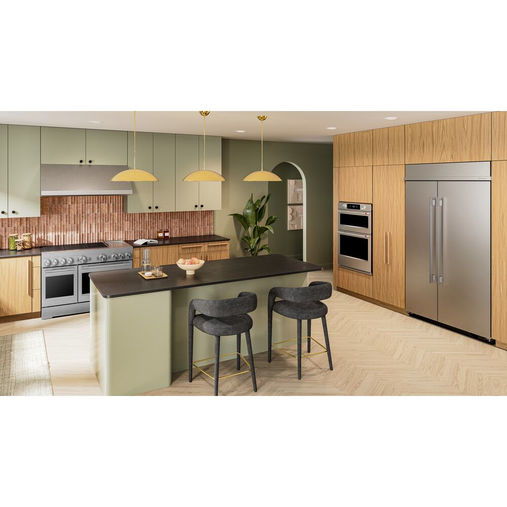 Modern kitchen featuring a stainless steel 48-inch induction range with six elements and built-in griddle in a stylish setting