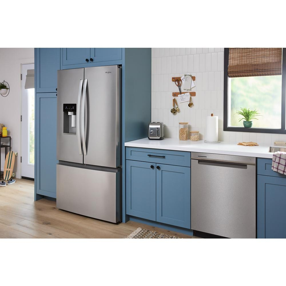 36-inch wide stainless steel 3-door French door refrigerator with bottom freezer in modern kitchen setting