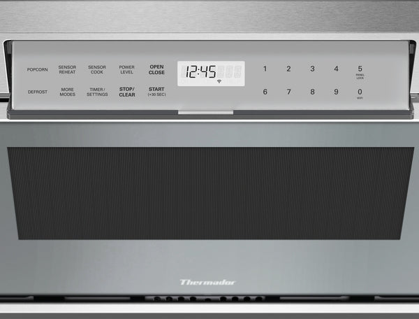 Digital control panel and numeric keypad on stainless steel microwave drawer for kitchen appliances collection