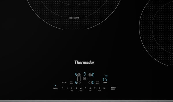 Black Thermador electric cooktop with touch controls and multiple cooking zones for modern kitchen appliances collection