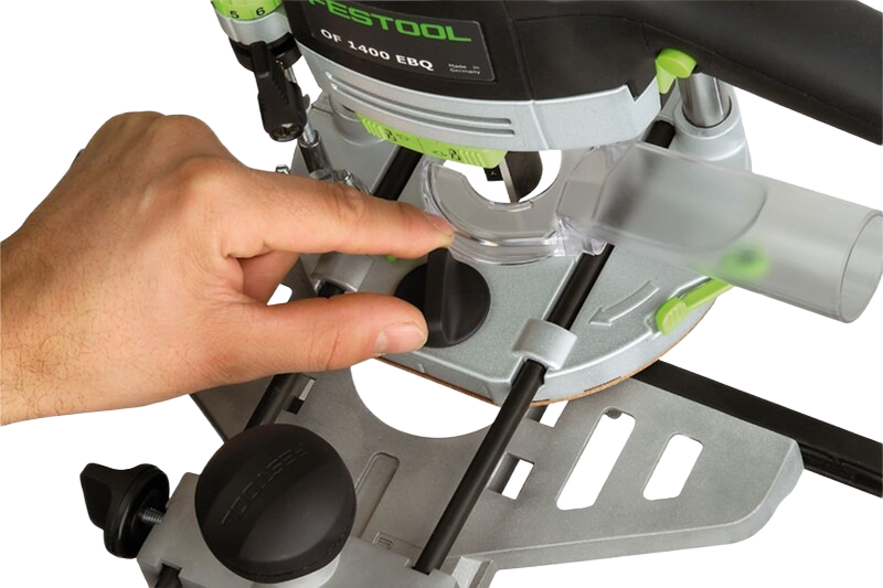 Hand adjusting Festool OF 1400 router edge guide accessory for precise woodworking tool setup under $100 collections