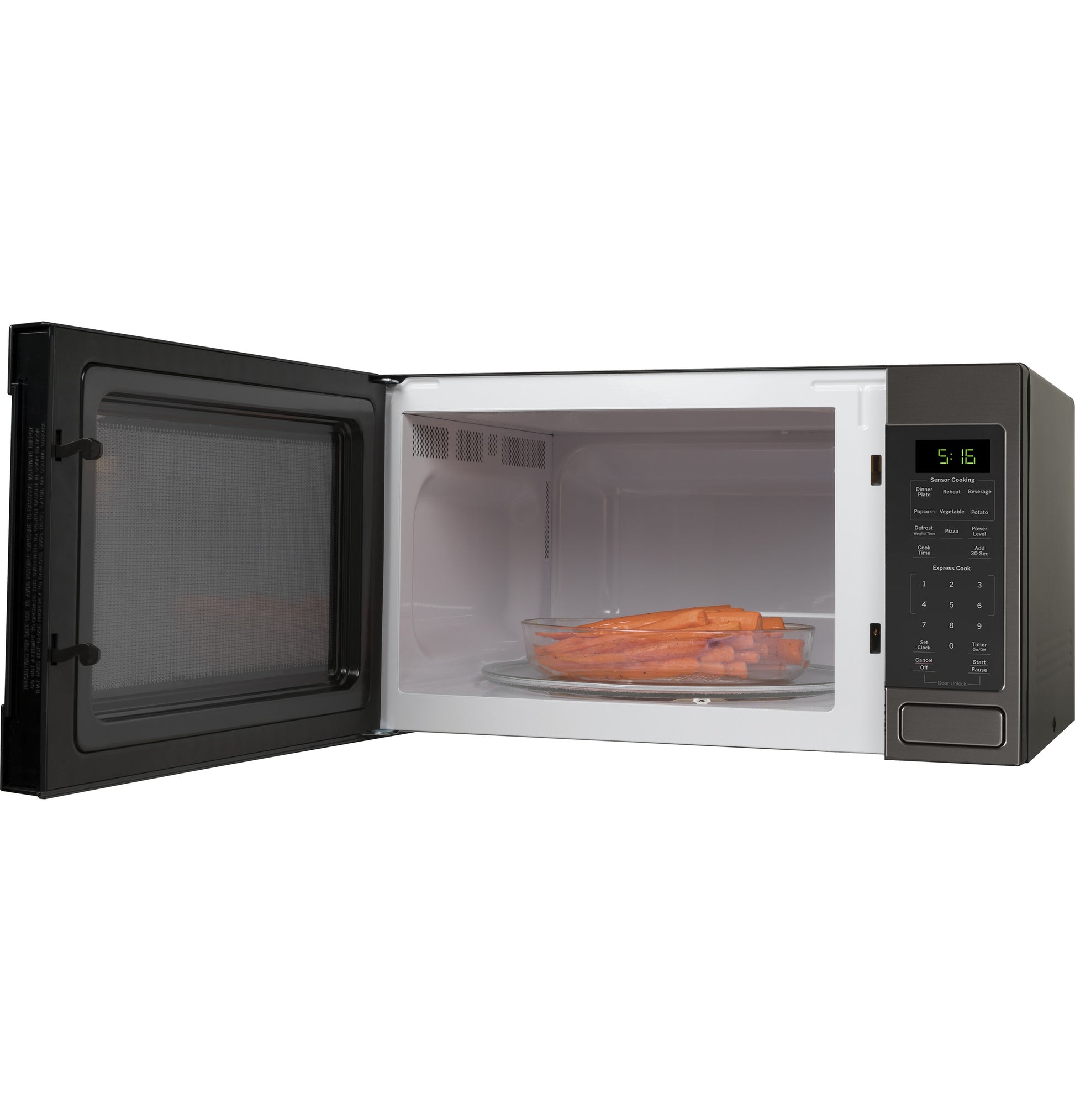 Countertop microwave with open door showing glass turntable and fresh carrots inside in Kitchen & Kitchenware and Appliances collections