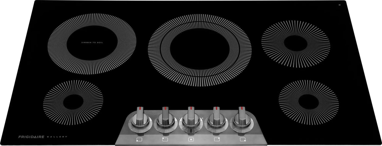 36-inch black electric cooktop with five heating elements and stainless steel control knobs in kitchen appliances collection