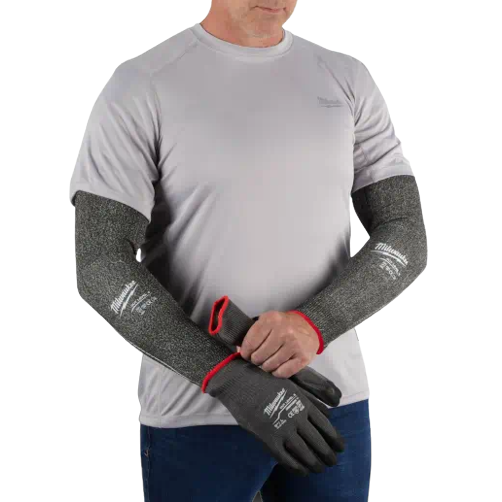 Gray cut-resistant sleeves with red trim paired with black gloves for hand and arm protection in tools and home improvement tasks
