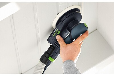 Handheld Festool random orbit sander with ergonomic grip used for precise sanding in power tools and home improvement projects