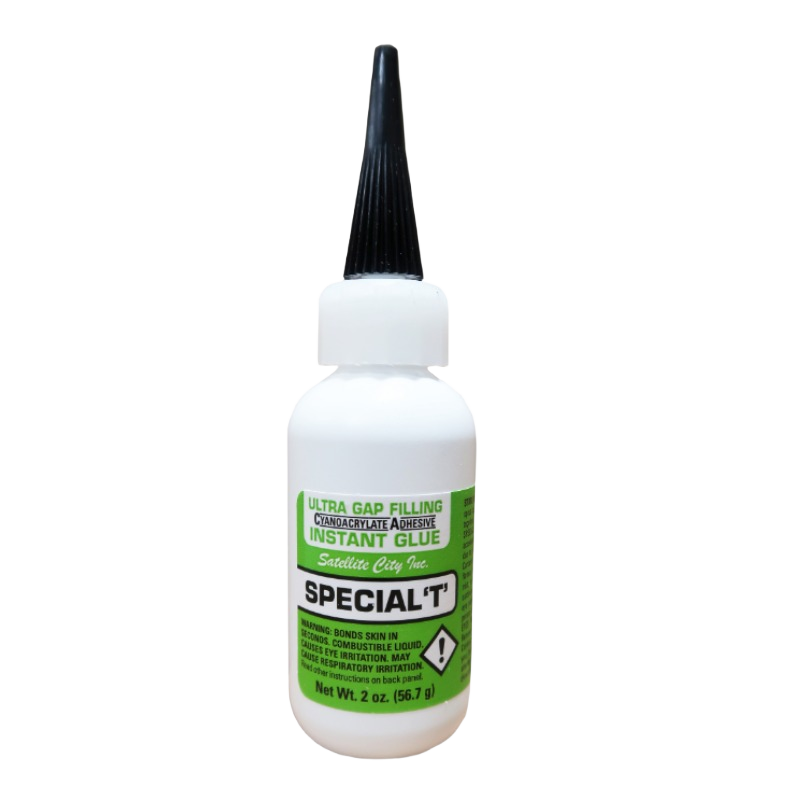 White bottle of Satellite City instant adhesive glue labeled for ultra gap filling in home improvement and repair projects