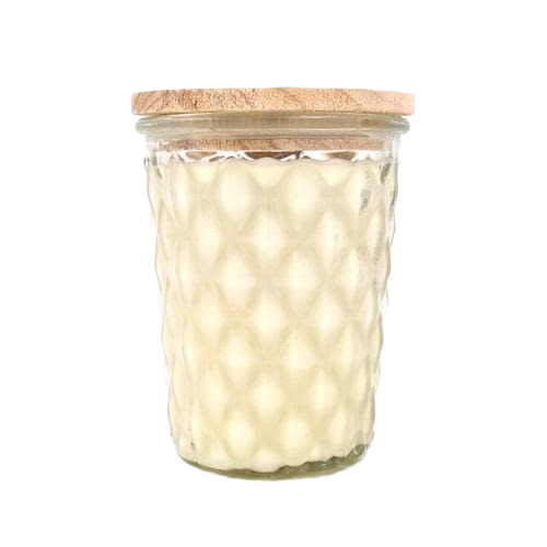Cream-colored wax candle in textured glass jar with wooden lid for home decor and relaxation ambiance