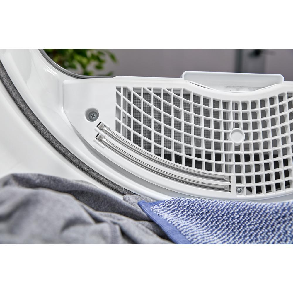 Close-up view of white gas dryer interior vent and fabric from Dryers and Appliances collections