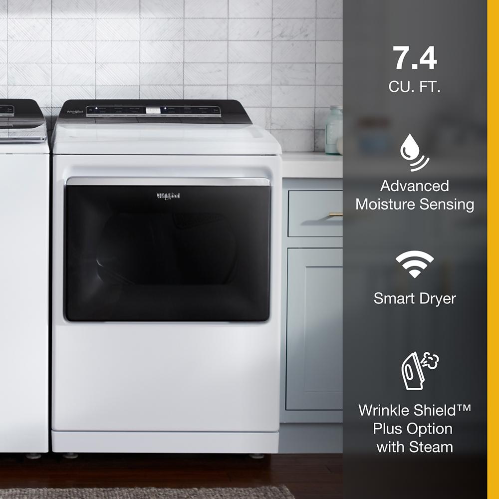 White electric dryer with advanced moisture sensing and wrinkle shield plus steam option in modern laundry room setting