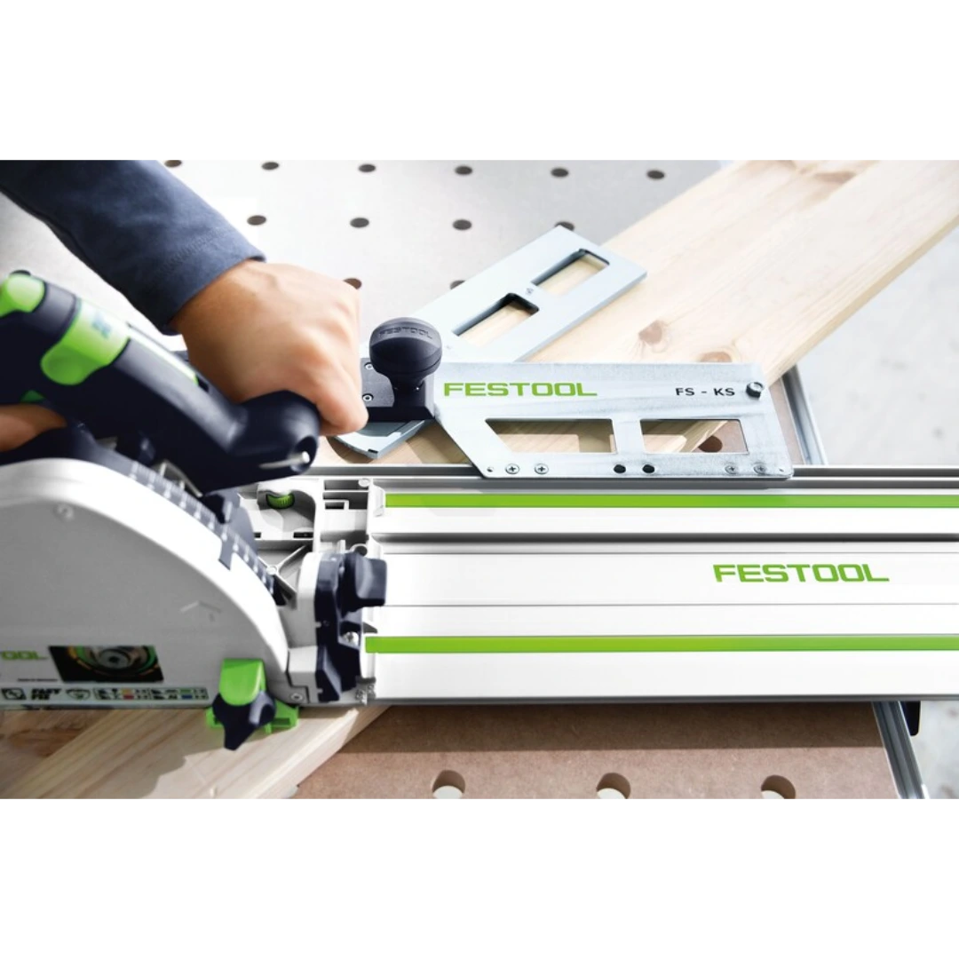 Woodworker using a Festool guide rail system on wood board for precise cuts in woodworking tool accessories collections