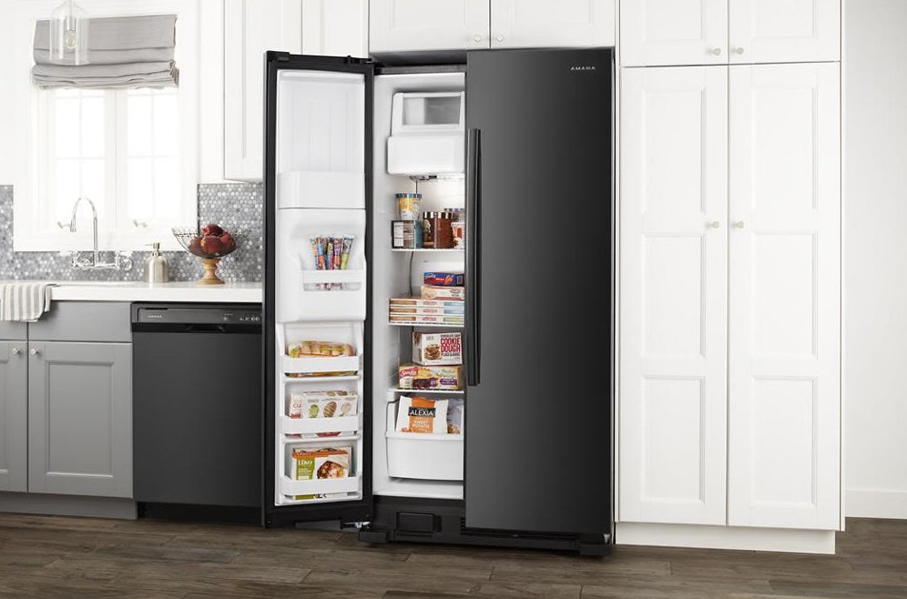 36-inch black side-by-side refrigerator open to show organized interior in modern kitchen from Appliances collection