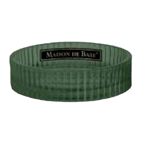 Round sage green glass soap dish with textured sides and Maison de Base label for bathroom organization