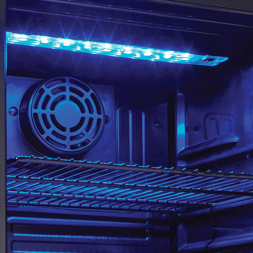 interior view of beverage center with blue LED lighting and metal wire shelf in kitchen appliances collection