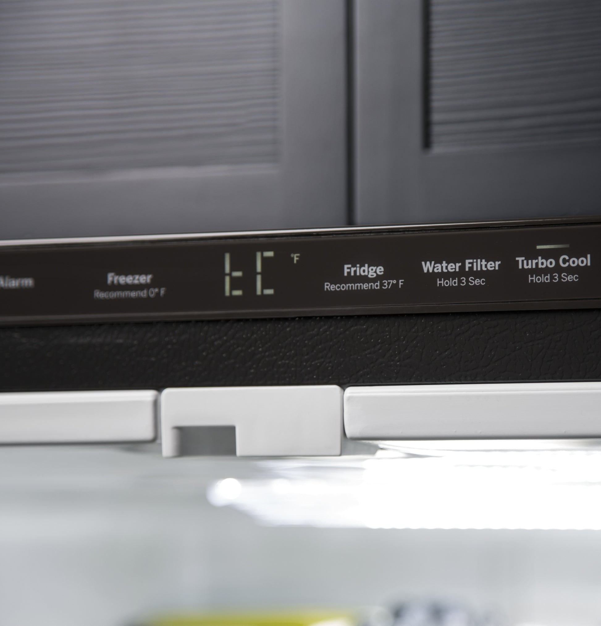 Digital control panel showing fridge and freezer temperature settings on bottom-freezer refrigerator from kitchen appliances collection