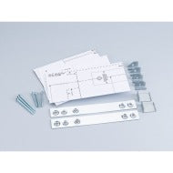 Set of metal brackets, screws, and instruction sheets for undercabinet mounting in kitchen appliance repairs.