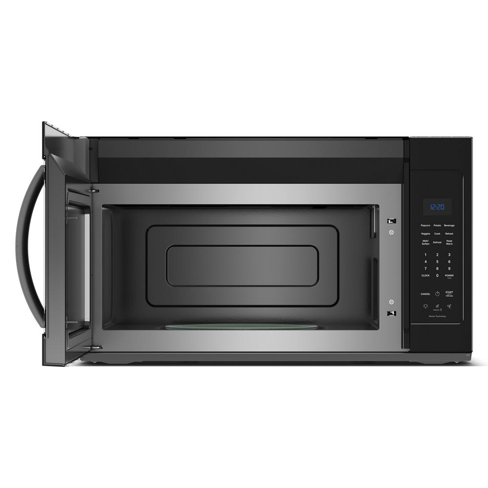 Interior view of black over-the-range microwave with digital keypad and sensor cooking controls visible in kitchen appliance setting