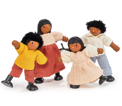 Set of four wooden dolls dressed in colorful fabric clothing representing a playful family scene