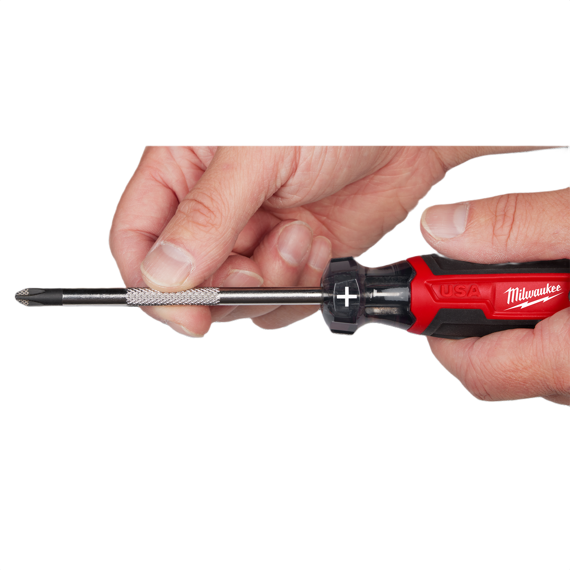 Hand holding Milwaukee screwdriver with knurled shank and red and black cushion grip for home improvement tasks
