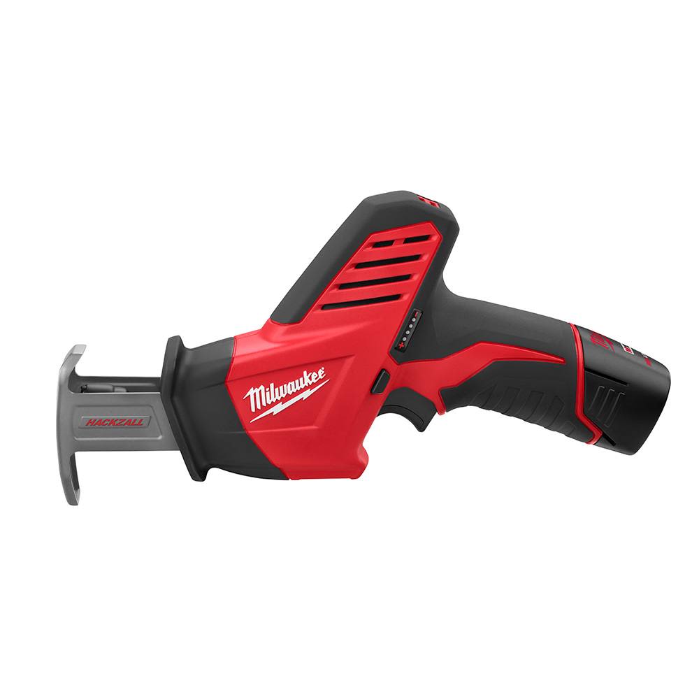 Cordless red and black compact reciprocating saw with ergonomic handle for woodworking and home improvement tasks