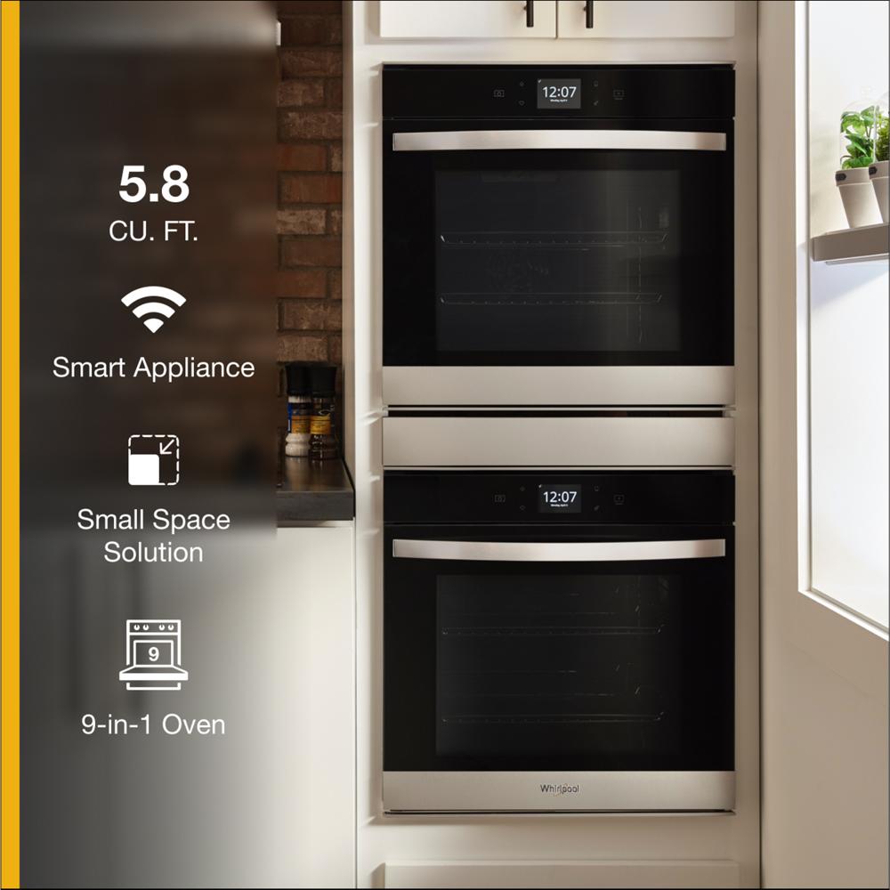 Built-in 24 inch double wall oven with smart controls and sleek stainless steel design in a modern kitchen setting