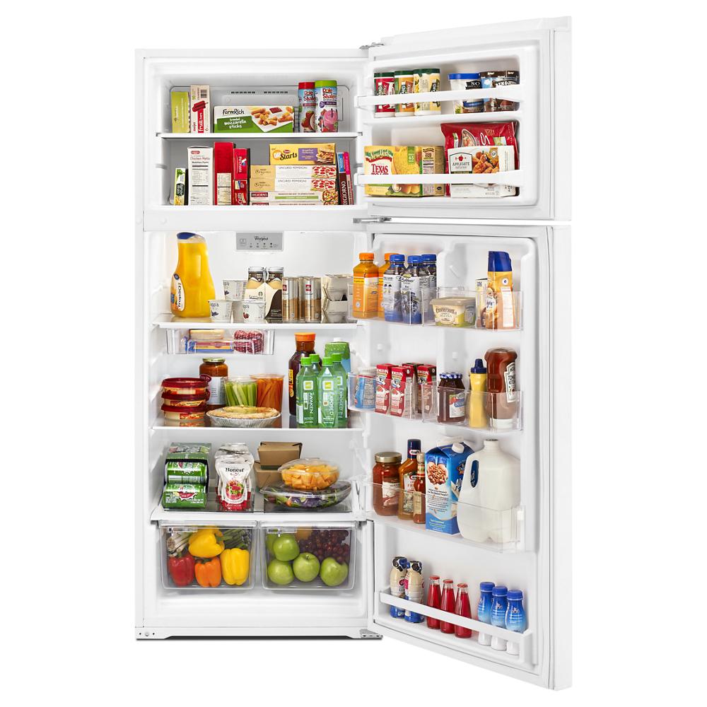 Open 28-inch wide white top-freezer refrigerator filled with groceries from refrigerators and kitchen appliances collections