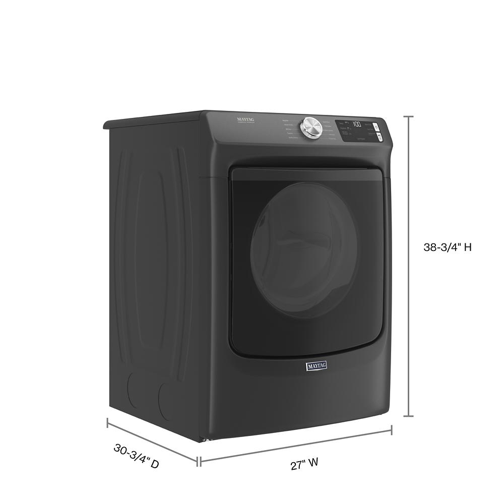 Matte black front load gas dryer with digital display, control knob, and large window in modern appliance setting