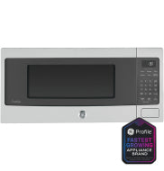 Countertop microwave oven in stainless steel with digital keypad and dark glass door from kitchen appliances collection